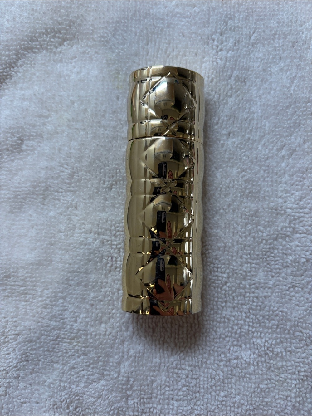 DIOR Gold Embossed Cylindrical Case